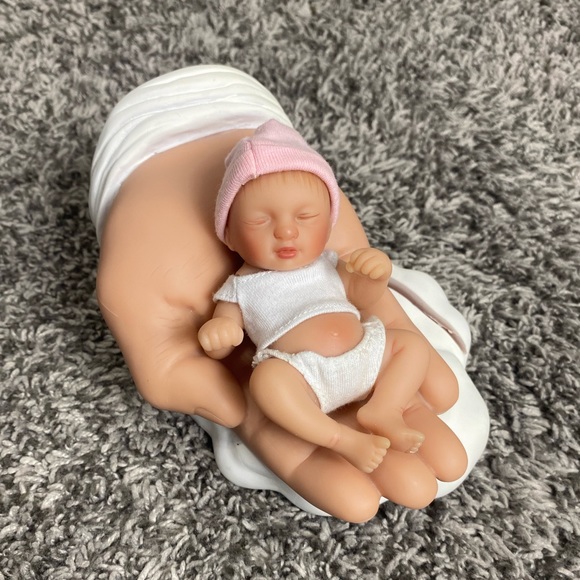 Baby In The Hand Display - Picture 3 of 4